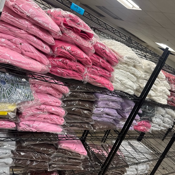 Assorted Pink White and Brown Clothing